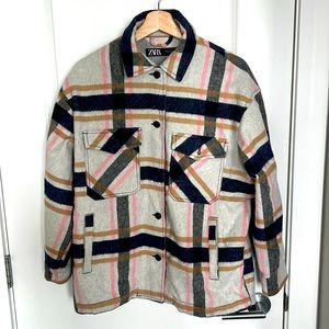 ZARA USA S.   Vibrant colors, including white, blue, pink and brown